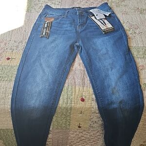Blue Skinny Jeans with Subtle Fading One Stain